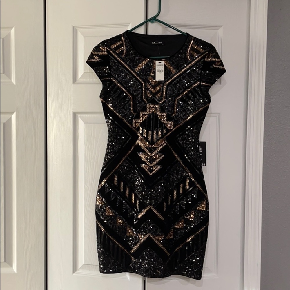 Express gold and black sequence dress.